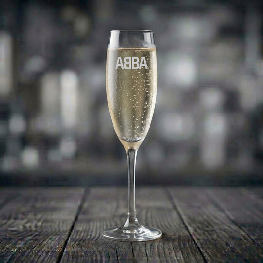 Champagneglas med ABBA motiv