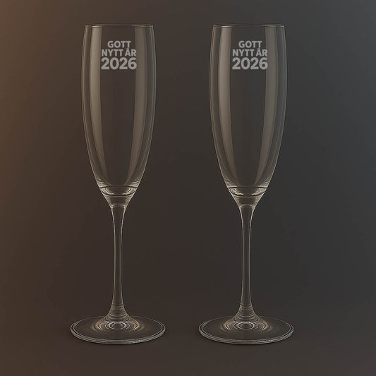 Champagneglas med texten Gott nytt år 2026