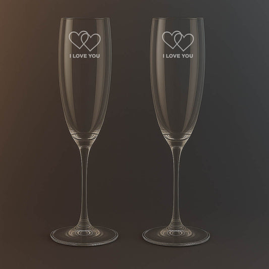 Champagneglas med texten I love you och 2st hjärtan
